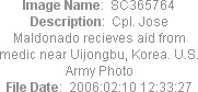 Image Name:  SC365764
Description:  Cpl. Jose Maldonado recieves aid from medic near Uijongbu, Korea. U.S. Army Photo
File Date:  2006:02:10 12:33:27