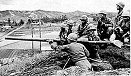 Rifle crew of M Company, 3rd Battalion, with a 75mm recoilless rifle, guarding a valley north of Chorwan, June 15, 1951.  U.S. ARMY PHOTO