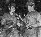 WANNA BURP?-SFC Virgilio Agosto-Baquero (left, Canovanas, P.R., and M/Sgt. Austin Montero-Negron, Utuado, P.R. examine a Chinese "burp gun" captured during a recent attack in Korea. The men are members of Company L of the 65th Puerto Rican Infantry Regiment. (U.S. Army Photo by Pvt. Peter Pineiro)