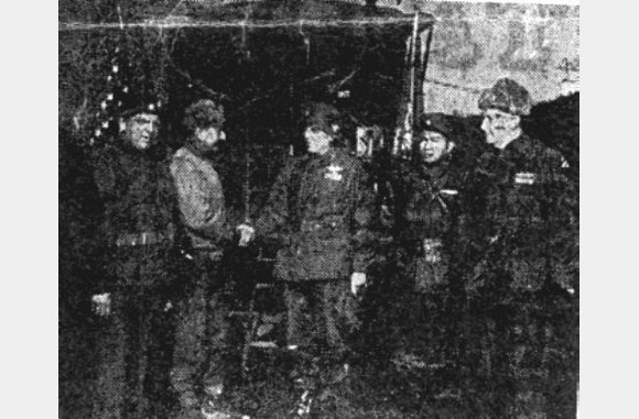 NEW COMMANDER- Col. Juan Cesar Cordero (second from left), new commander of the 65th Infantry (Puerto Rican) Regiment, 3d Division, shakes hands with former CO, Col. Julian B. Lindsey (center), recently assigned deputy assistant division commander of the 3d Division. Present at the hand- clasping ceremonies, were Lt. Col. Norbert Cools (left), com- mander of Belgian forces in Korea, Lt. Col. H.B. Tuazon (second from right), executive officer of the Philippine forces and Brig. Gen. Thomas J. Cross (far right), commander of the 3d . (U.S. Army Photo by Pvt. Peter Pineiro)