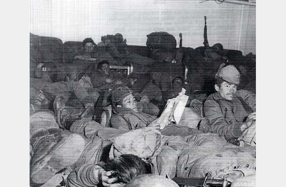 Soldiers of the 65th Infantry Regiment awaiting to be evacuated from Hungnam, Korea.