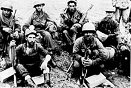 Battle weary soldiers return to safety behind the lines after two days of being trapped north of the Han River. U.S. Army Photo