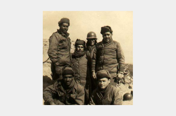 Cpl. Ramiro Rivera Martinez ( front left) and friends.