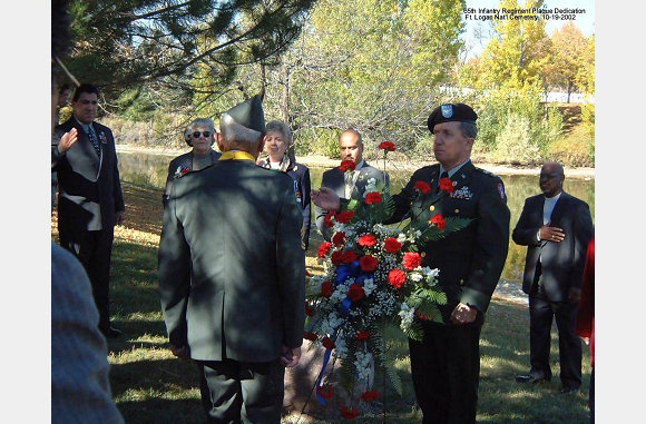  10/19/2002--Fort Logan National Cemetery, Denver, Colorado (center: SFC Modesto Cartagena, Col. Bill Neal, 50th Anniversary of the Korean War Committee, Left to Right: Mr. Anthony Mele, Chairman, 65th Honor Task Force, Mrs. Mildred Harris (BG Harris widow),  Mrs. Lynn Harris-Armstrong (BG Harris daughter), Mr. Carlos Cartagena (SFC Cartagena grandson),  Mr. O'Neal, Events Officer, Fort Logan National Cemetery)