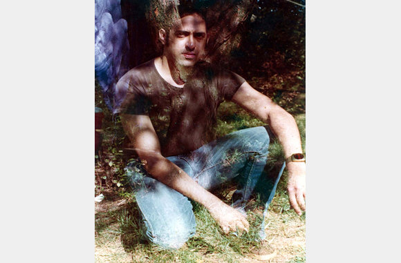 Self portrait - double exposure in front of tree at uncle Clem's Summer bungalo at Platikill, N.Y..- 1978