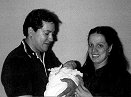 My cousin Gary, his daughter Lisa, and his wife Maria. - 1977