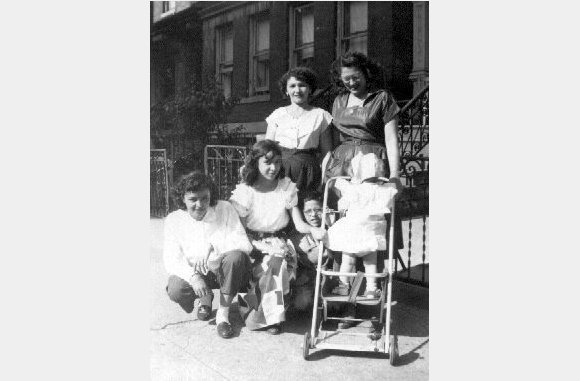 My aunt Carmen Delia, my sister Mildred, next door neighbor, my mother Emillia and my youngest sister Ruth Yolanda. 1952