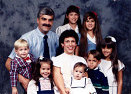 My sister Ruth Yolanda, her husband Les, and 7 of her 9 children.
