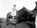 My uncle Juanin Nieves on horse back, being led by my grandfather Lorenzo Nieves Ortiz. - 1946