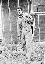 T/Sgt. Clement Resto with flight suit and parachute