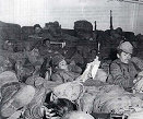 Soldiers of the 65th Infantry Regiment awaiting to be evacuated from Hungnam, Korea.